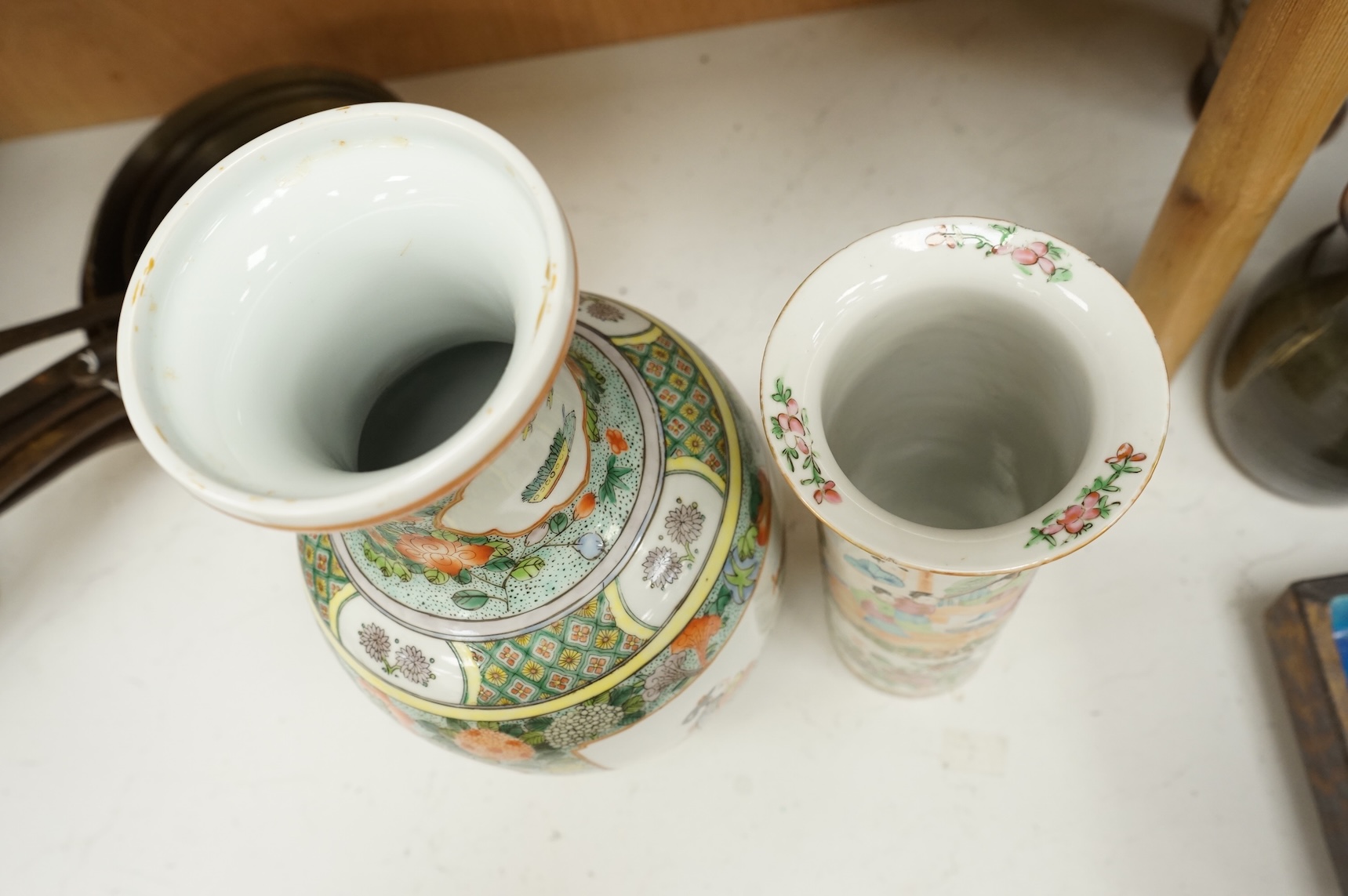 Two Chinese porcelain vases to include a famille rose sleeve vase and a larger famille verte vase, 36cm high